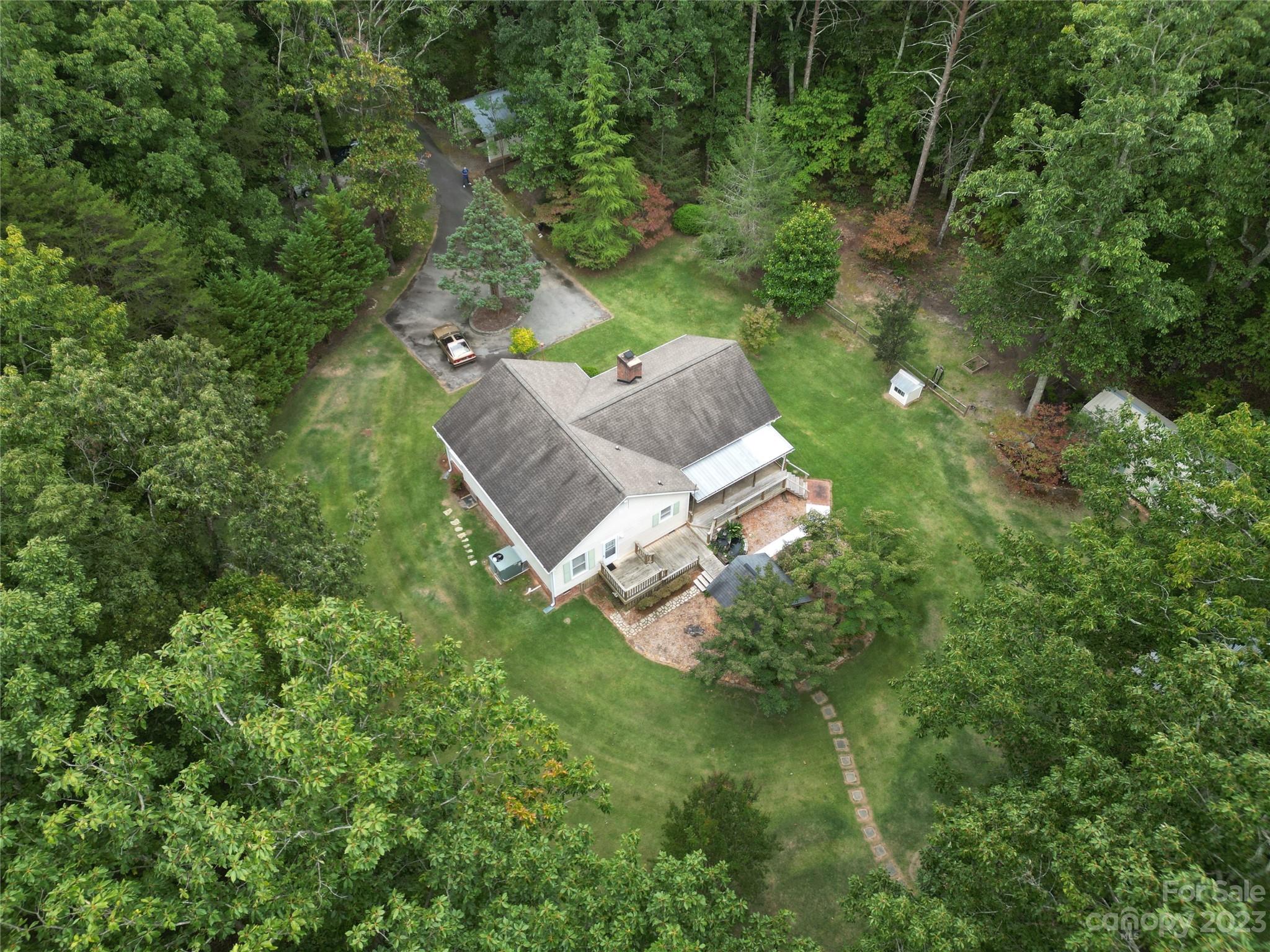 256 Georgewoods Drive Dallas, NC 28034 - Photo 44 of 45 an aerial view of a house with a yard