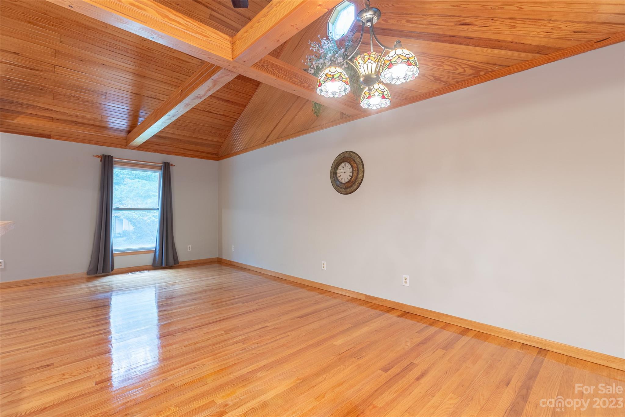 256 Georgewoods Drive Dallas, NC 28034 - Photo 8 of 45 a view of an empty room with a window