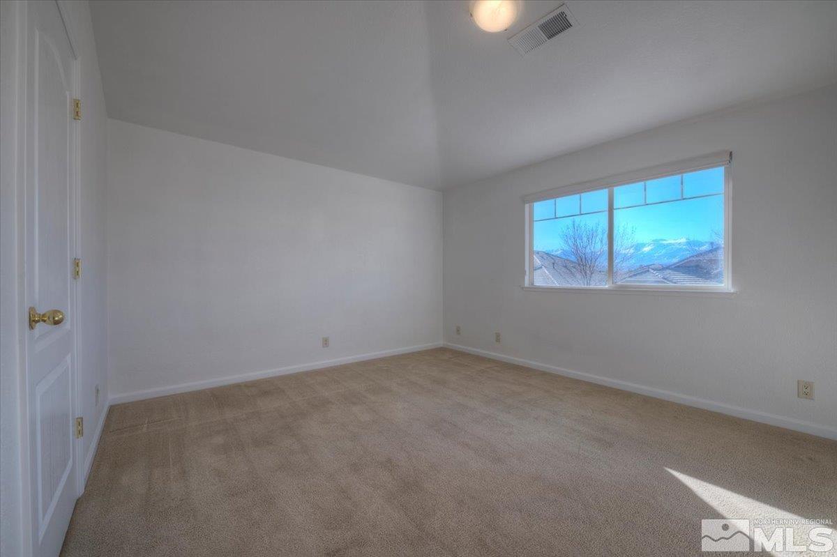 10016 Cascade Falls Drive Reno, NV 89521 - Photo 31 of 40 an empty room with a window