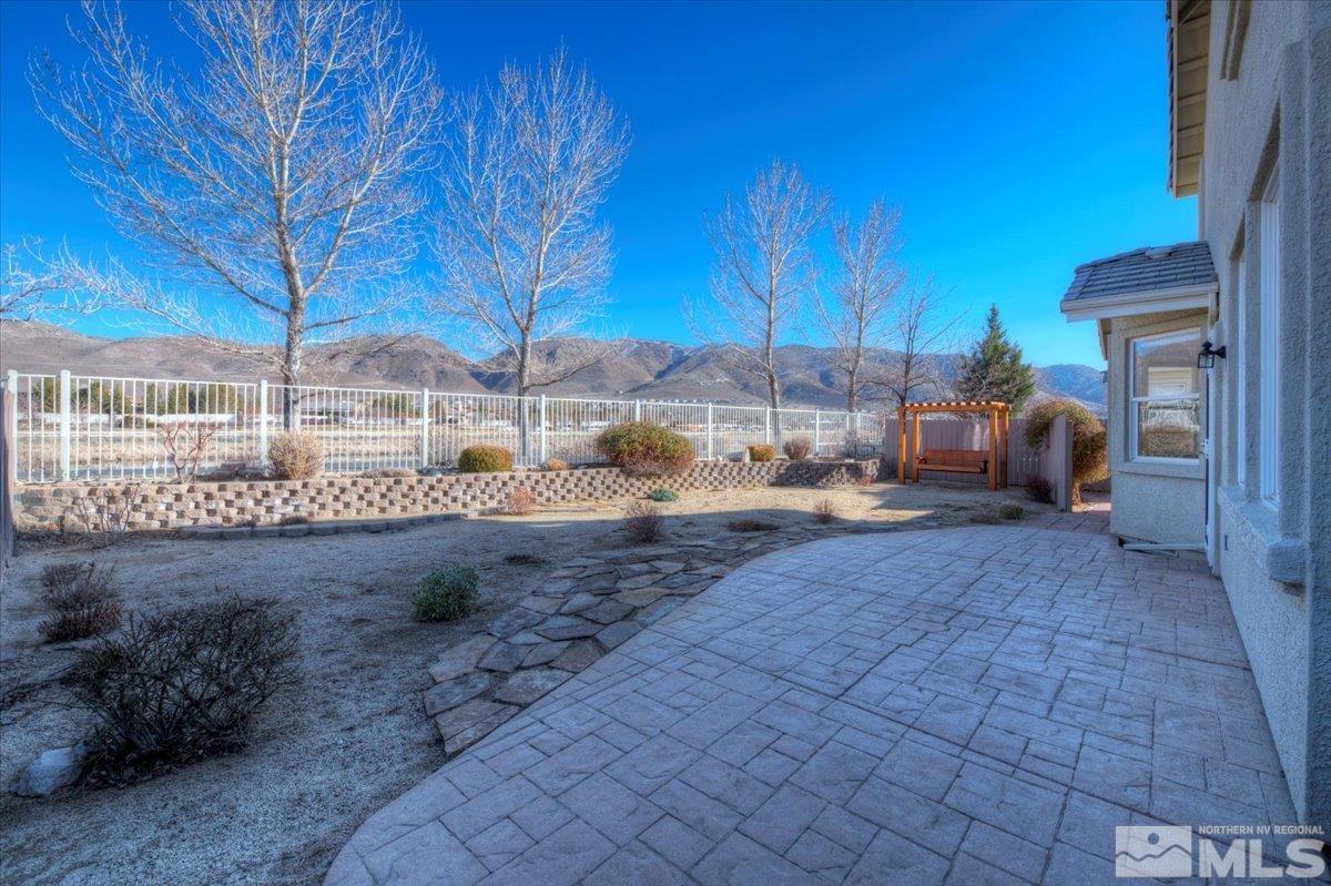 10016 Cascade Falls Drive Reno, NV 89521 - Photo 36 of 40 a view of a yard with an outdoor space