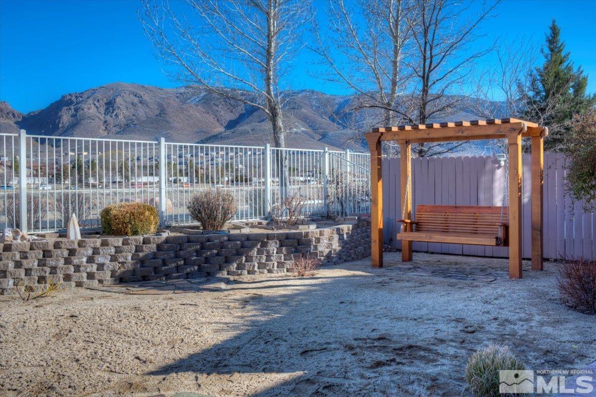 10016 Cascade Falls Drive Reno, NV 89521 - Photo 5 of 40 a view of a house with backyard and sitting area