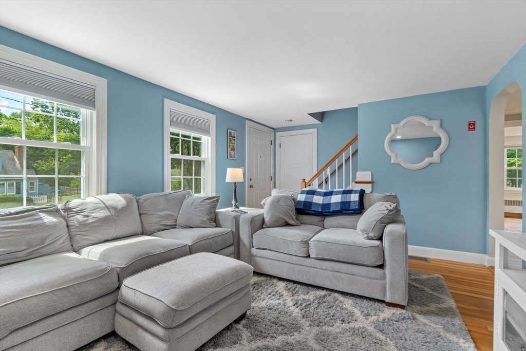 61 Broad Street Walpole, MA 02081 - Photo 12 of 37 a living room with furniture and a large window