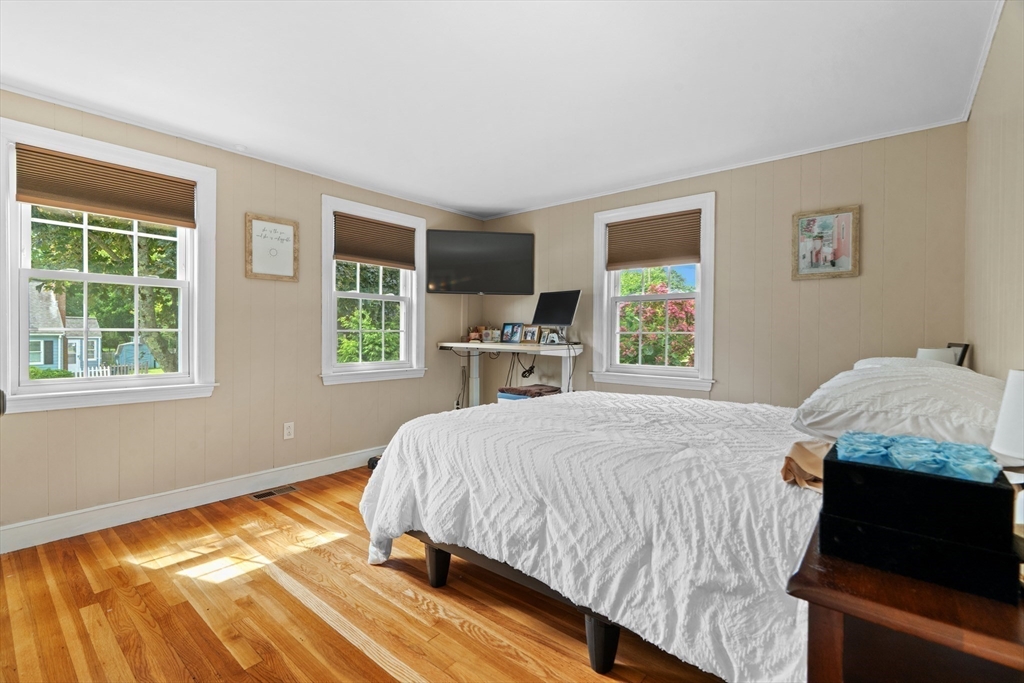 61 Broad Street Walpole, MA 02081 - Photo 13 of 37 a bedroom with a bed and a window