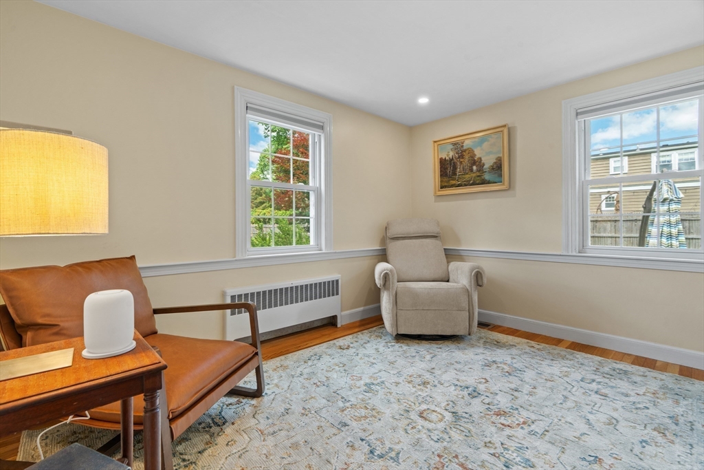 61 Broad Street Walpole, MA 02081 - Photo 14 of 37 a living room with furniture and a window