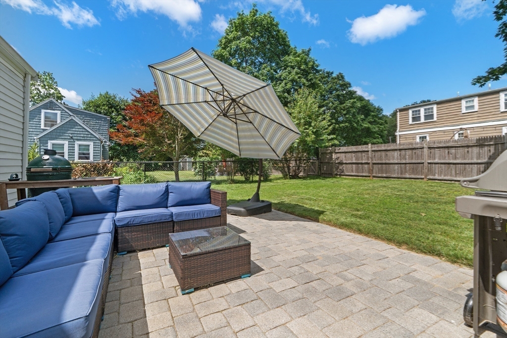 61 Broad Street Walpole, MA 02081 - Photo 22 of 37 a view of a patio with couches and a fire pit
