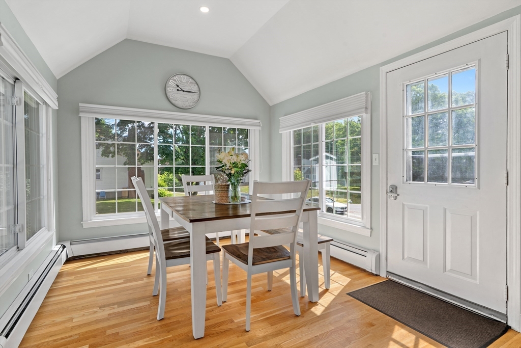 61 Broad Street Walpole, MA 02081 - Photo 30 of 37 a view of a dining room with furniture window and wooden floor