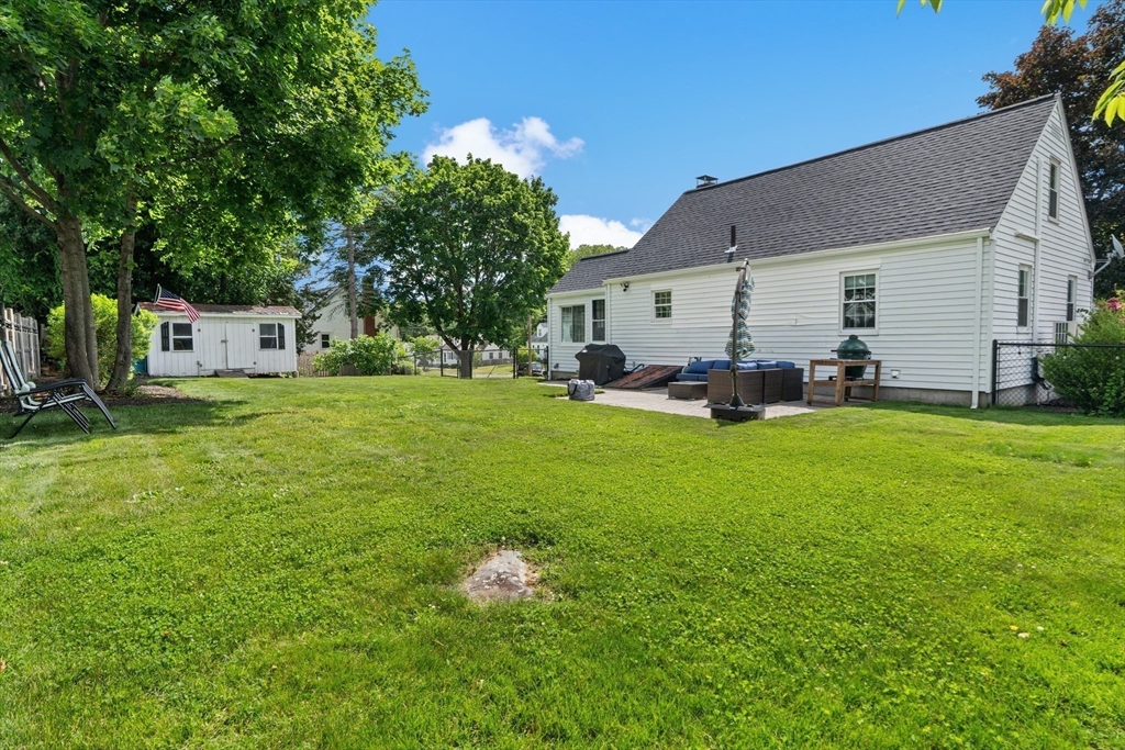 61 Broad Street Walpole, MA 02081 - Photo 33 of 37 a view of a house with a backyard