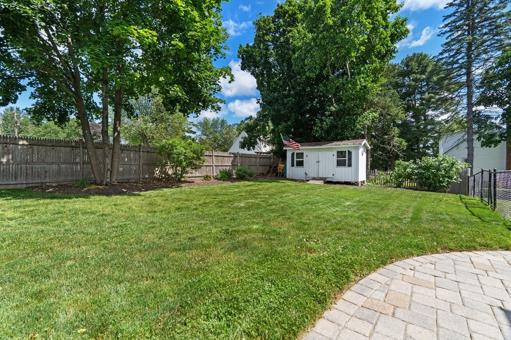 61 Broad Street Walpole, MA 02081 - Photo 37 of 37 a house view with a garden space