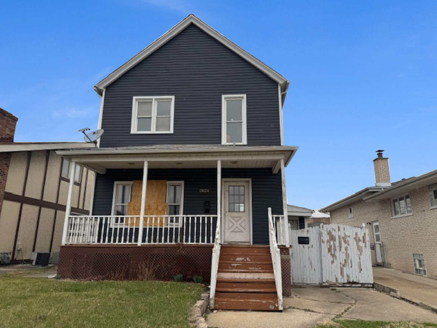 2024 Union Street Blue Island, IL 60406 - Photo 1 of 27 a view of a house with wooden fence