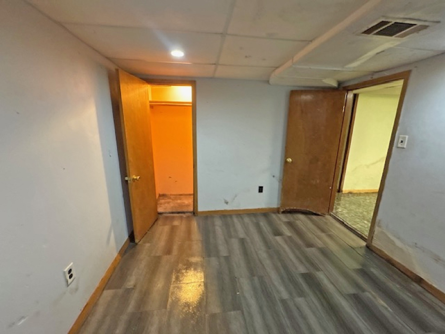 2024 Union Street Blue Island, IL 60406 - Photo 19 of 27 a view of a room with wooden floor and sliding door