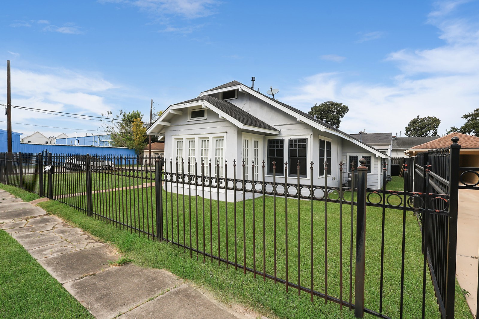5401 North Capitol Street Houston, TX 77011 - Photo 20 of 34 a front view of a house with backyard and garden