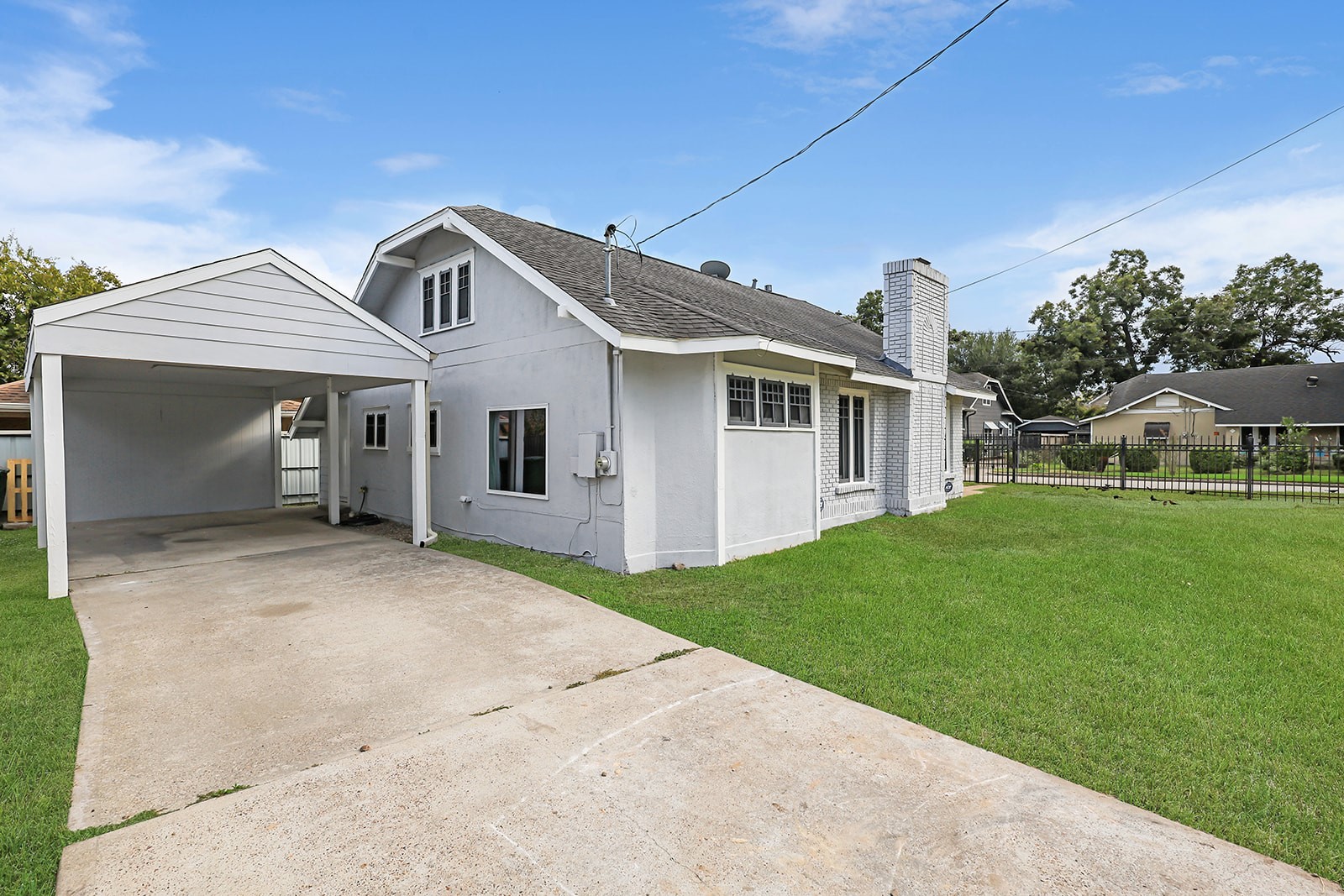 5401 North Capitol Street Houston, TX 77011 - Photo 24 of 34 a front view of a house with a yard