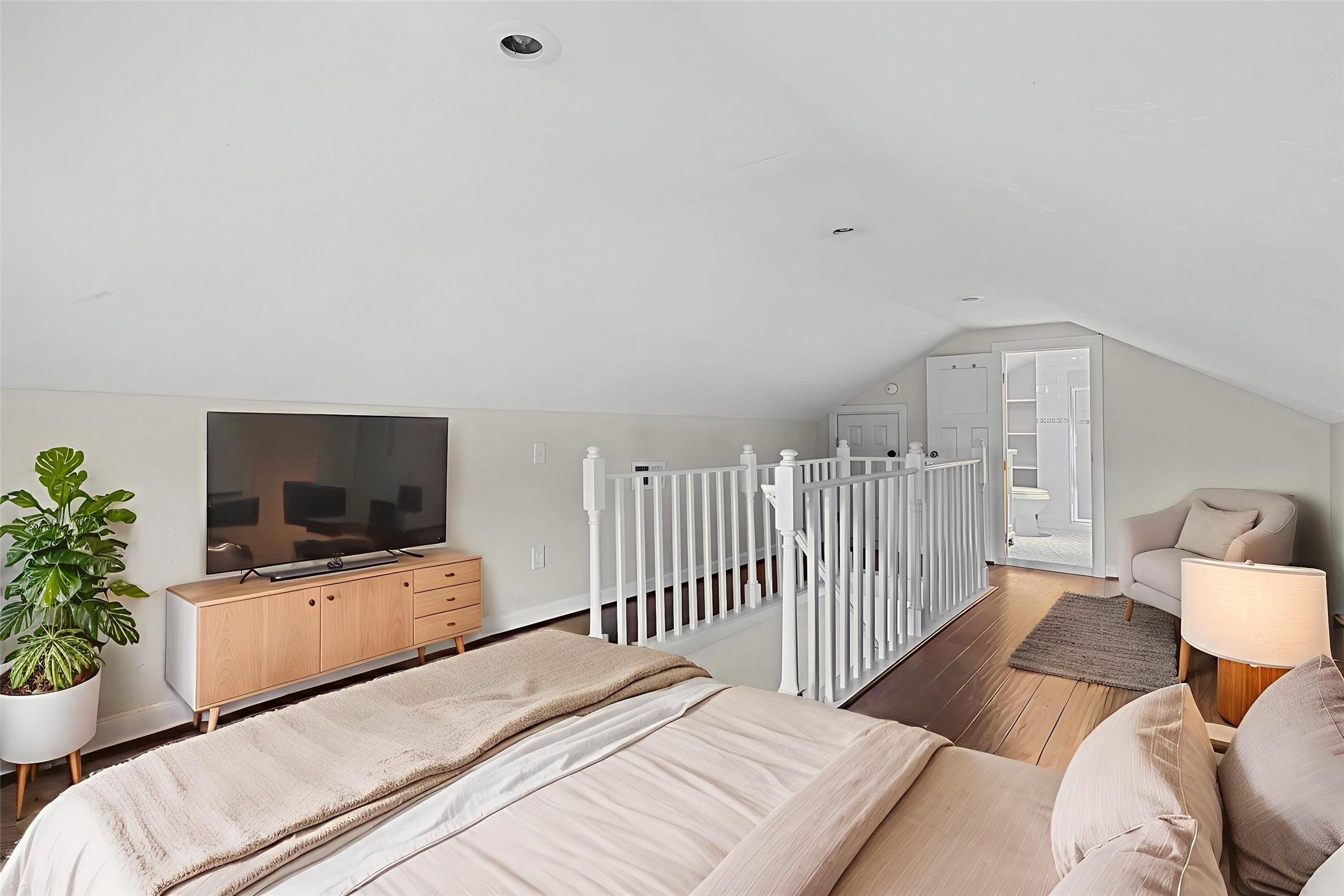 5401 North Capitol Street Houston, TX 77011 - Photo 5 of 34 a bedroom with a bed and a flat screen tv