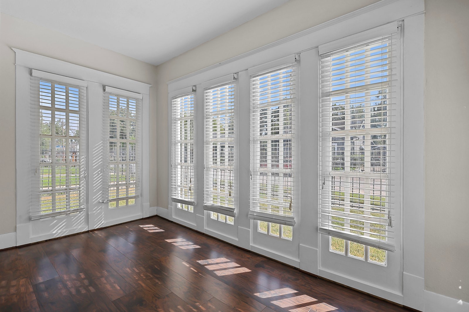 5401 North Capitol Street Houston, TX 77011 - Photo 9 of 34 a view of an empty room with wooden floor and a window
