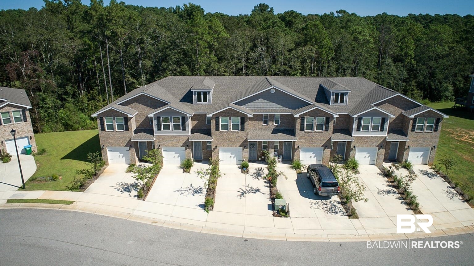 6771 Spaniel Drive Daphne, AL 36527 - Photo 2 of 41 2nd townhouse from left