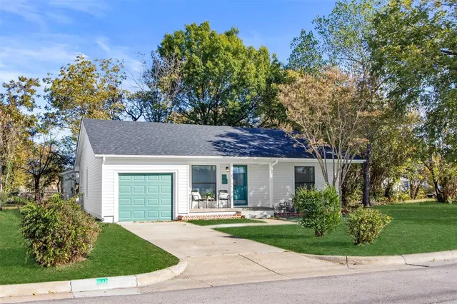 a house view with a garden space
