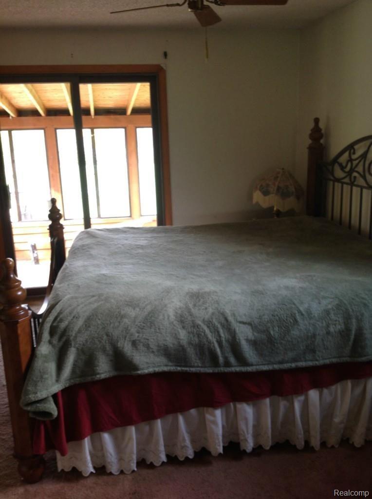 6147 Willis Road North Branch, MI 48461 - Photo 17 of 41 Master Bedroom looking onto All-Season Room