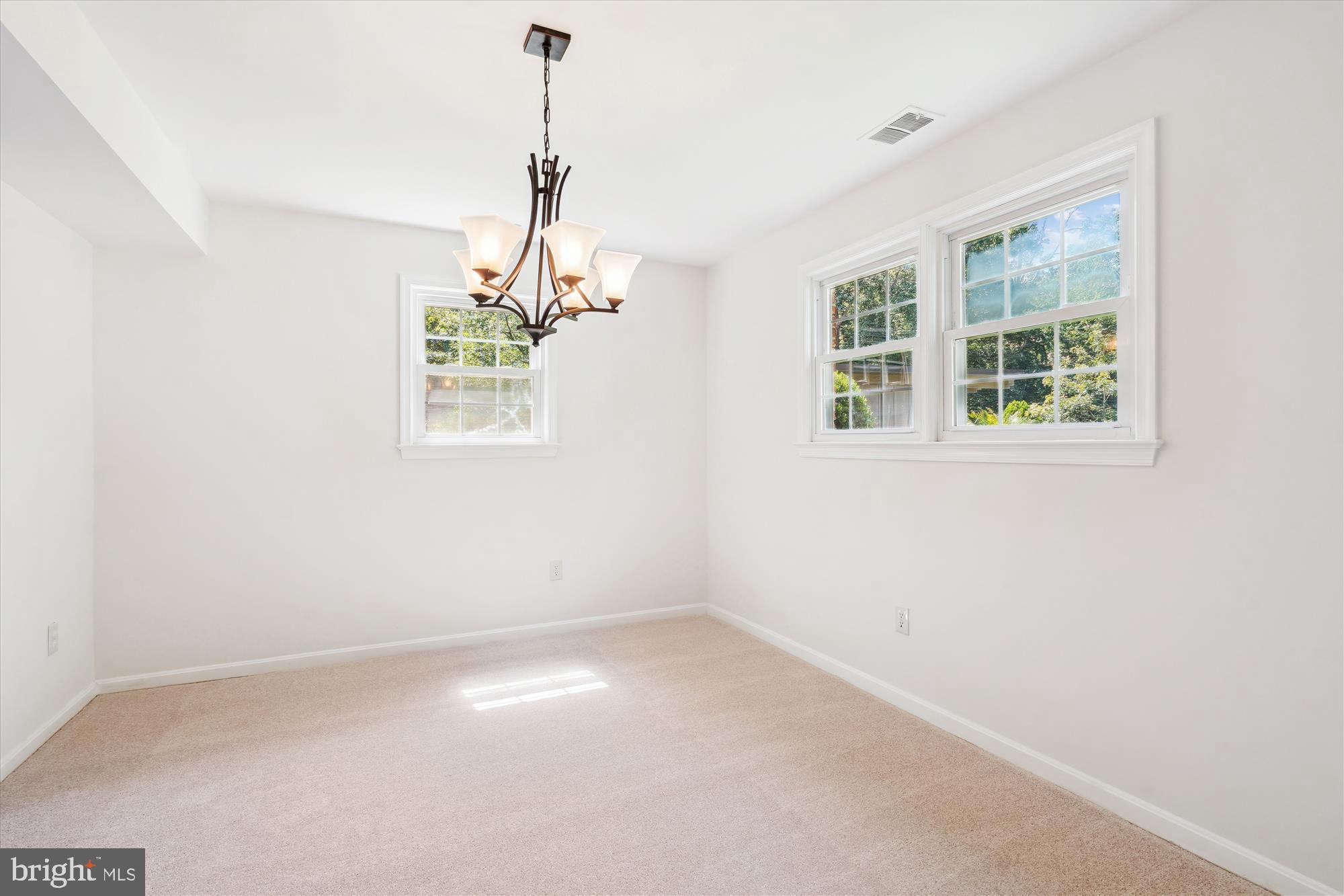 12109 Stirrup Road Reston, VA 20191 - Photo 11 of 52 a view of an empty room with a window