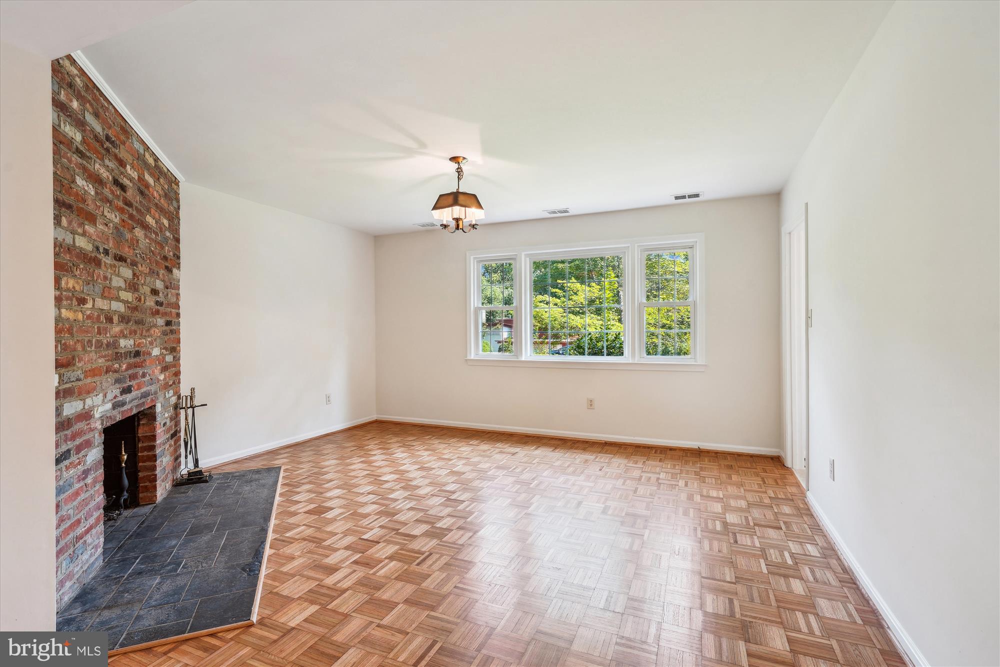 12109 Stirrup Road Reston, VA 20191 - Photo 17 of 52 an empty room with windows