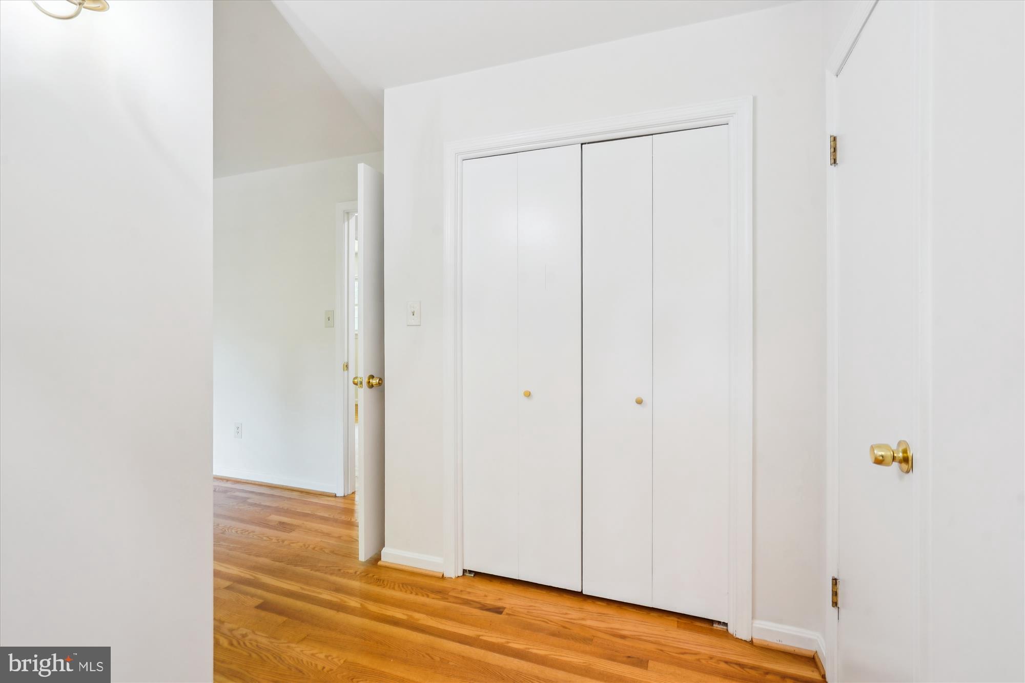 12109 Stirrup Road Reston, VA 20191 - Photo 26 of 52 a view of a room with wooden floor