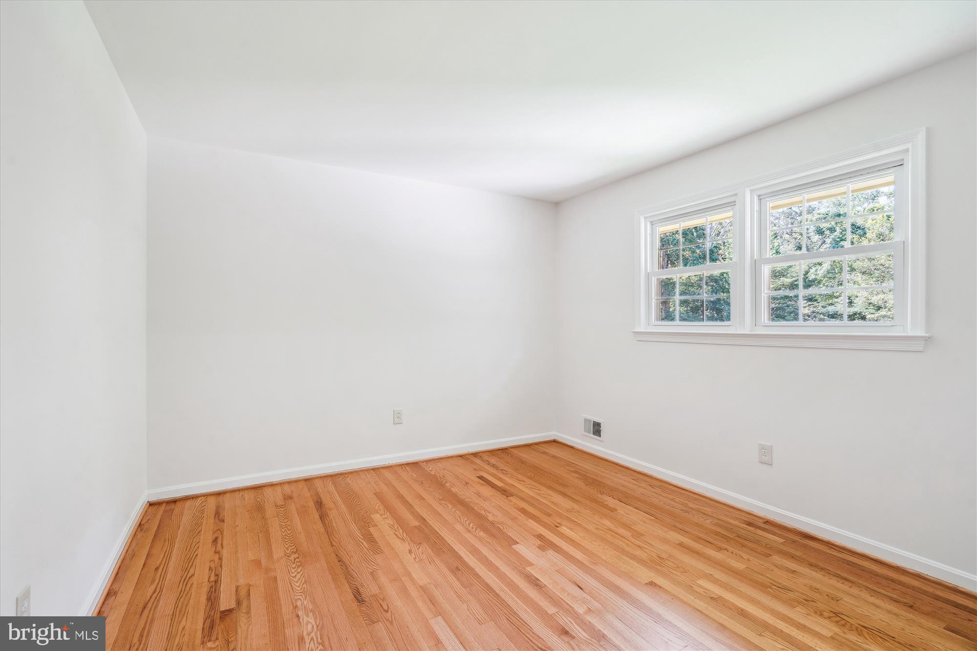 12109 Stirrup Road Reston, VA 20191 - Photo 32 of 52 an empty room with a window