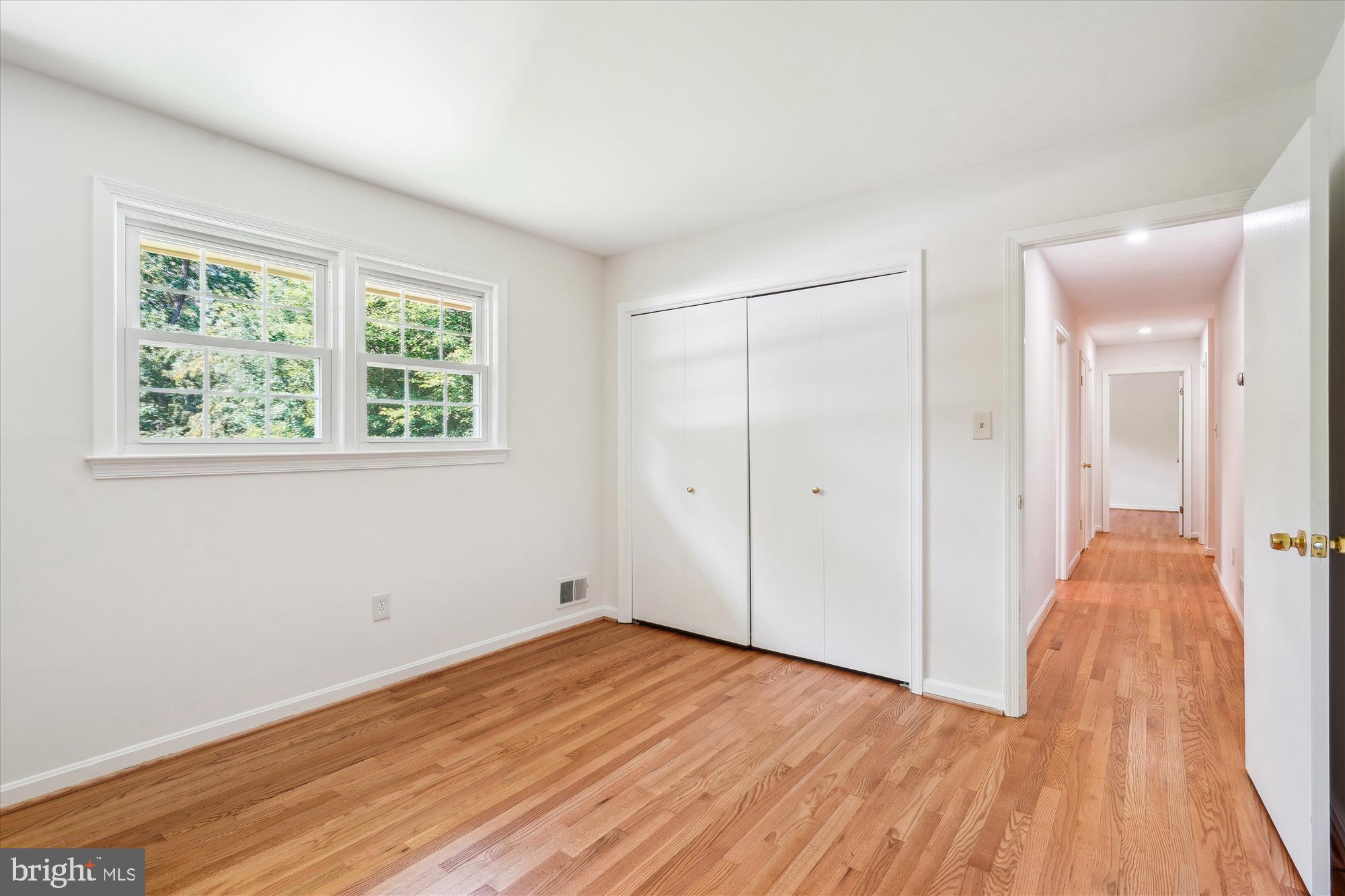 12109 Stirrup Road Reston, VA 20191 - Photo 33 of 52 a view of a room with wooden floor and a window