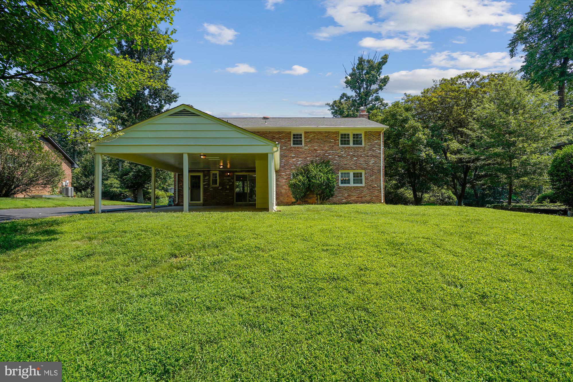 12109 Stirrup Road Reston, VA 20191 - Photo 43 of 52 a view of a house with a yard