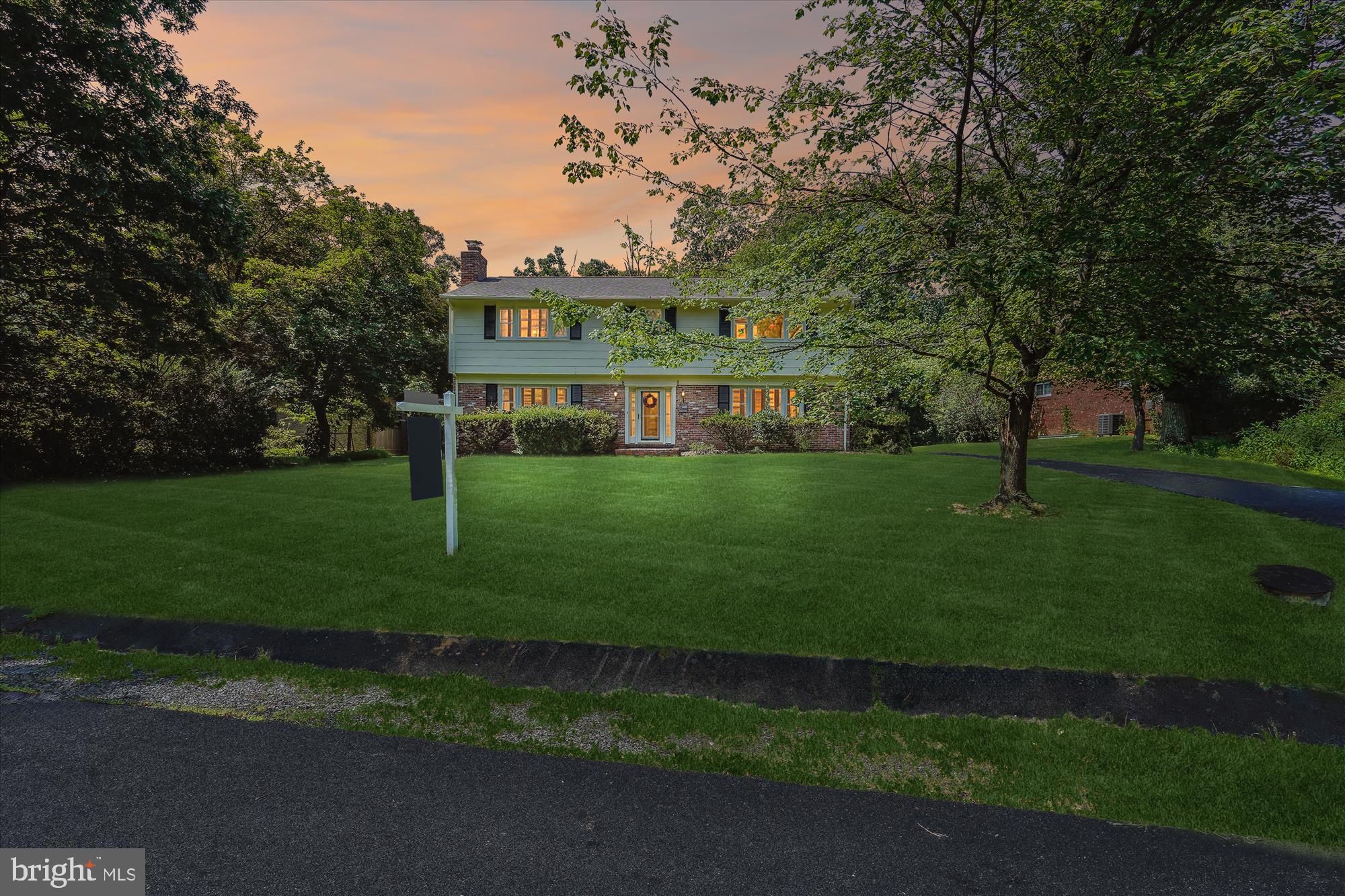 12109 Stirrup Road Reston, VA 20191 - Photo 47 of 52 a view of a house with a yard