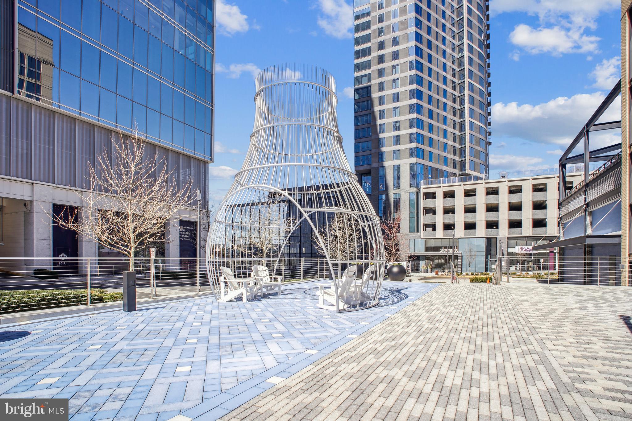 12109 Stirrup Road Reston, VA 20191 - Photo 49 of 52 a view of tall buildings with wooden floor