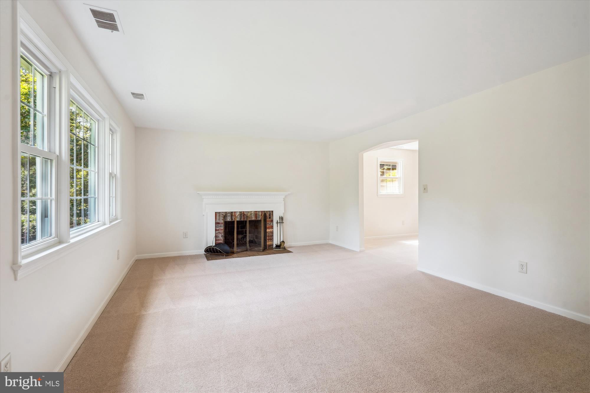 12109 Stirrup Road Reston, VA 20191 - Photo 7 of 52 a view of an empty room with a window