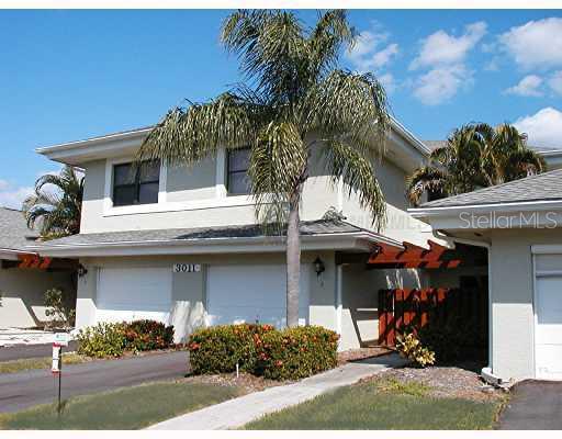 3011 Matecumbe Key Road, Unit 3 Punta Gorda, FL 33955 - Photo 1 of 1 Exterior Front - Wonderful 3 Bedroom 2 1/2 Bathroom 1 Car Garage Townhome with Golf Course View and Heated Pool Awaits You!