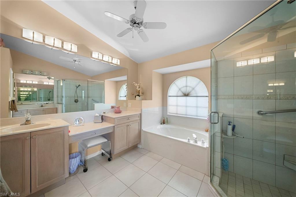 3971 Spring Garden Lane Estero, FL 33928 - Photo 6 of 31 a large spacious bathroom with a large tub shower and sink