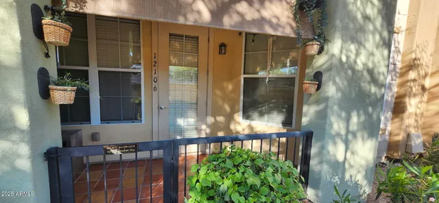 a front view of a house with a glass door