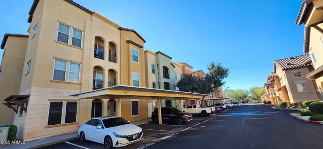 a front view of a building with street view