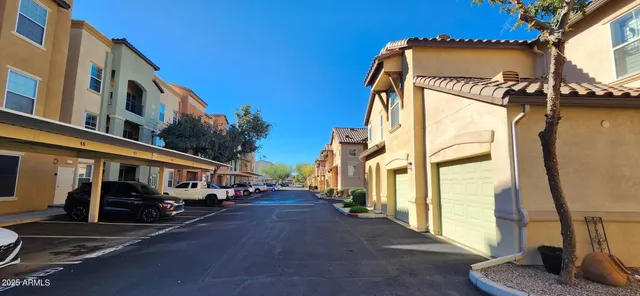 a view of a street with cars