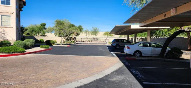 a view of a street with sitting area