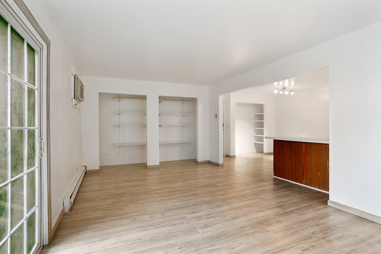 20206 South Frankfort Square Road, Unit F Frankfort, IL 60423 - Photo 3 of 16 a view of a big room with wooden floor and windows