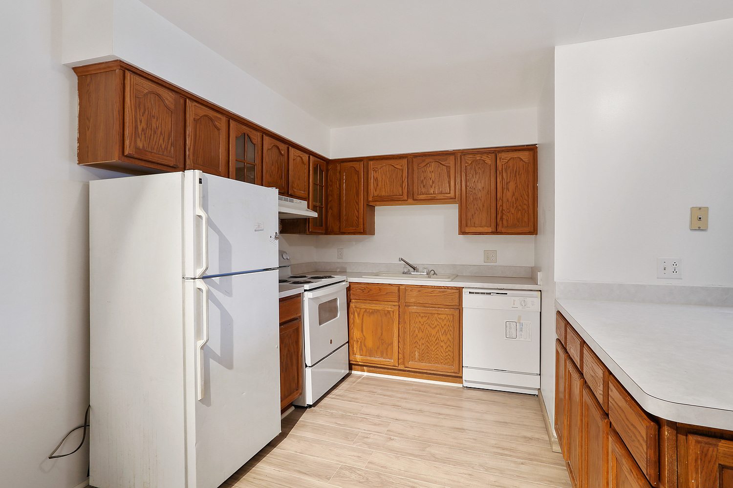 20206 South Frankfort Square Road, Unit F Frankfort, IL 60423 - Photo 6 of 16 a kitchen with stainless steel appliances granite countertop a refrigerator sink and cabinets