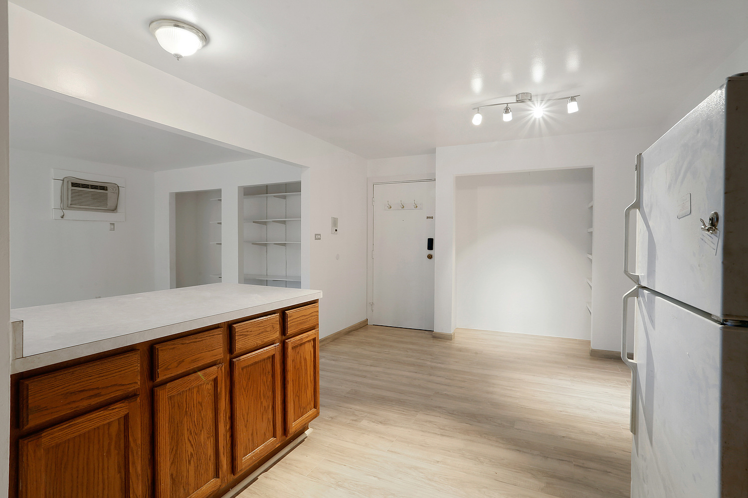 20206 South Frankfort Square Road, Unit F Frankfort, IL 60423 - Photo 7 of 16 a room with stainless steel appliances kitchen island a chandelier
