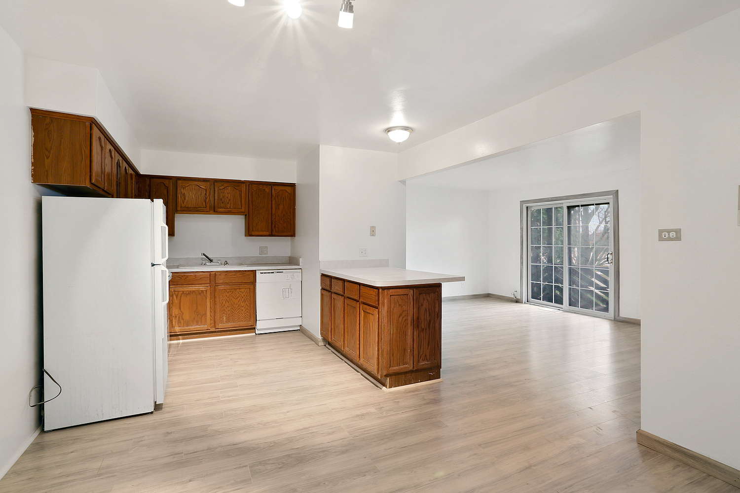 20206 South Frankfort Square Road, Unit F Frankfort, IL 60423 - Photo 8 of 16 a kitchen with stainless steel appliances a refrigerator and a stove top oven