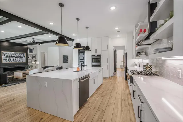 a front view of a house with yard and porch