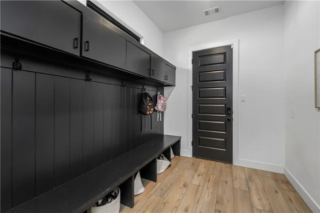 a utility room with sink dryer and washer