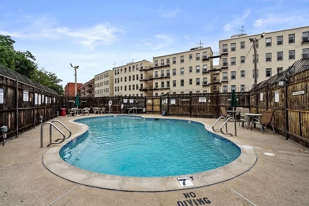 88 Gordon Street, Unit 306 Boston, MA 02135 - Photo 11 of 12 a view of a swimming pool with outdoor seating