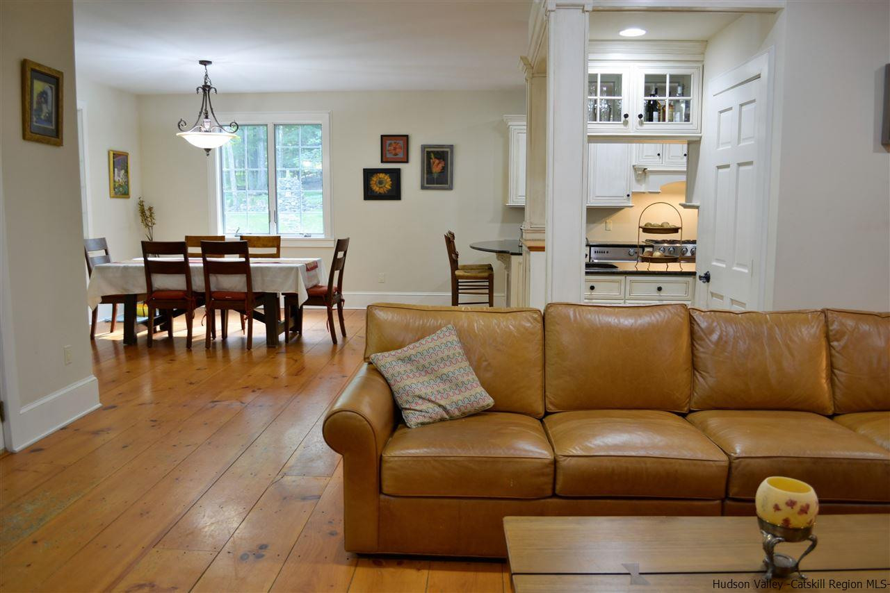 4651 Atwood Road Stone Ridge, NY 12484 - Photo 11 of 31 a living room with furniture and wooden floor