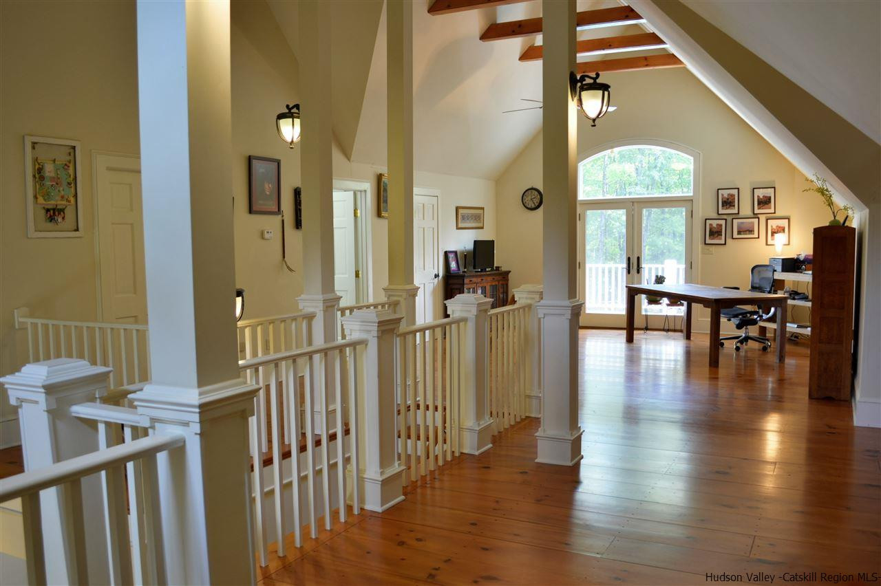 4651 Atwood Road Stone Ridge, NY 12484 - Photo 18 of 31 a view of a livingroom with furniture and hardwood floor