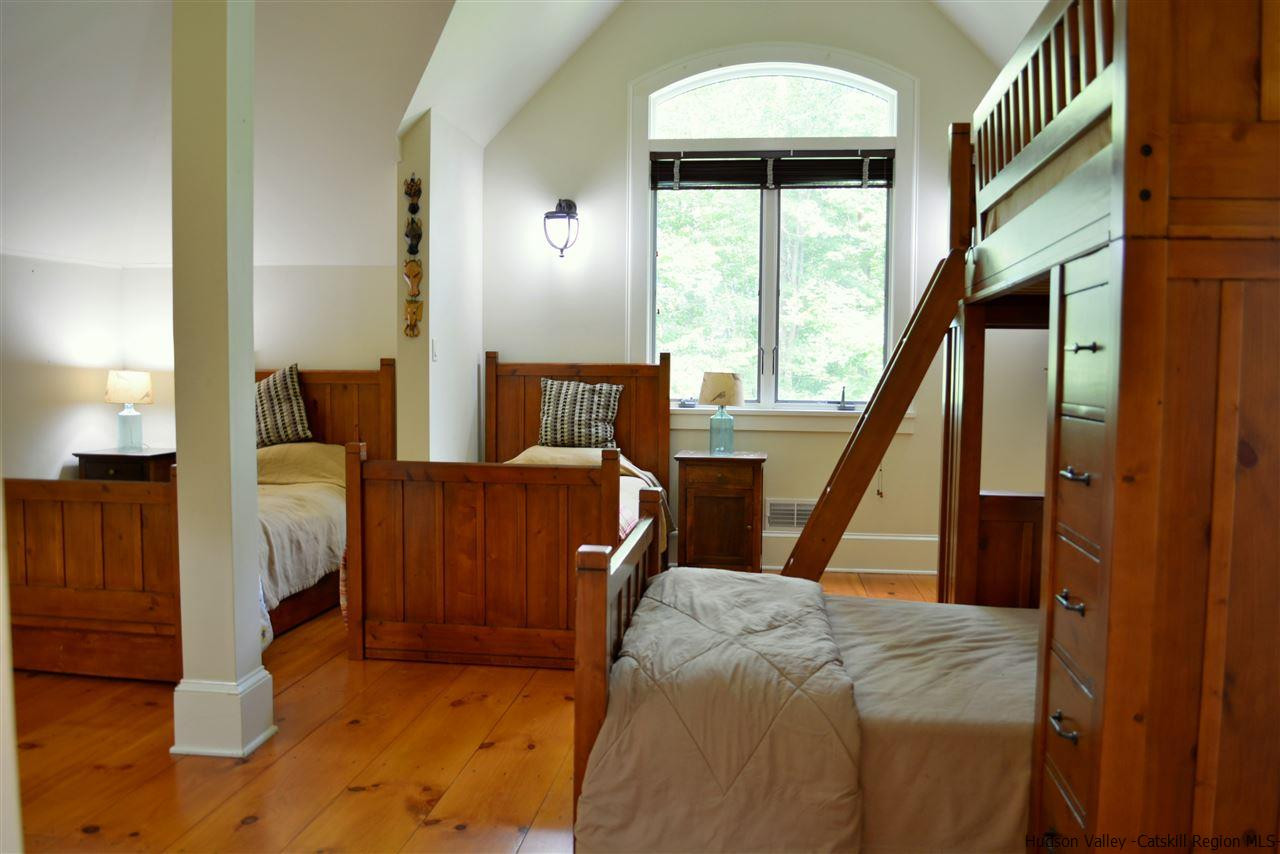 4651 Atwood Road Stone Ridge, NY 12484 - Photo 25 of 31 a bed room with furniture and a window