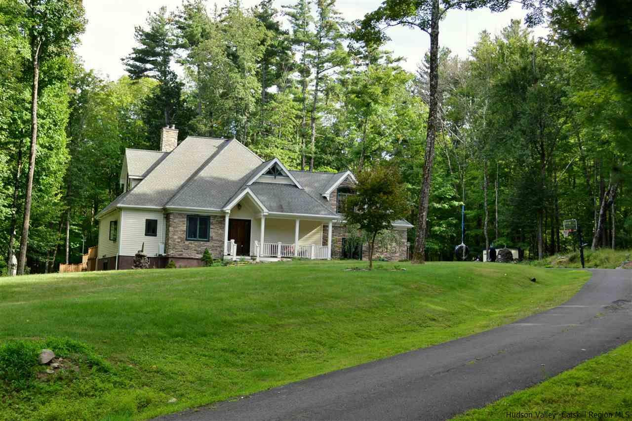 4651 Atwood Road Stone Ridge, NY 12484 - Photo 3 of 31 a front view of a house with a yard