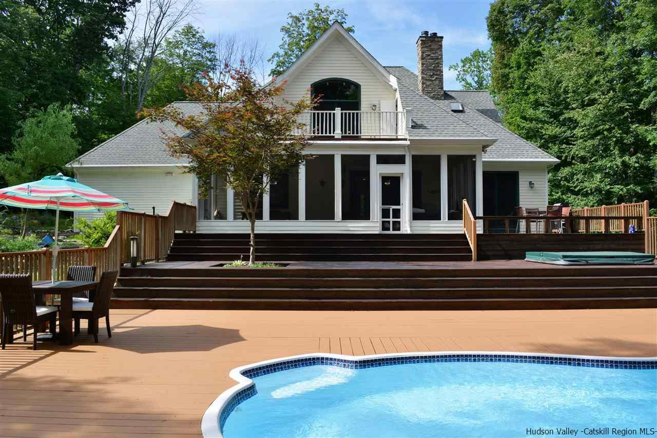 4651 Atwood Road Stone Ridge, NY 12484 - Photo 31 of 31 a front view of a house with swimming pool and furniture