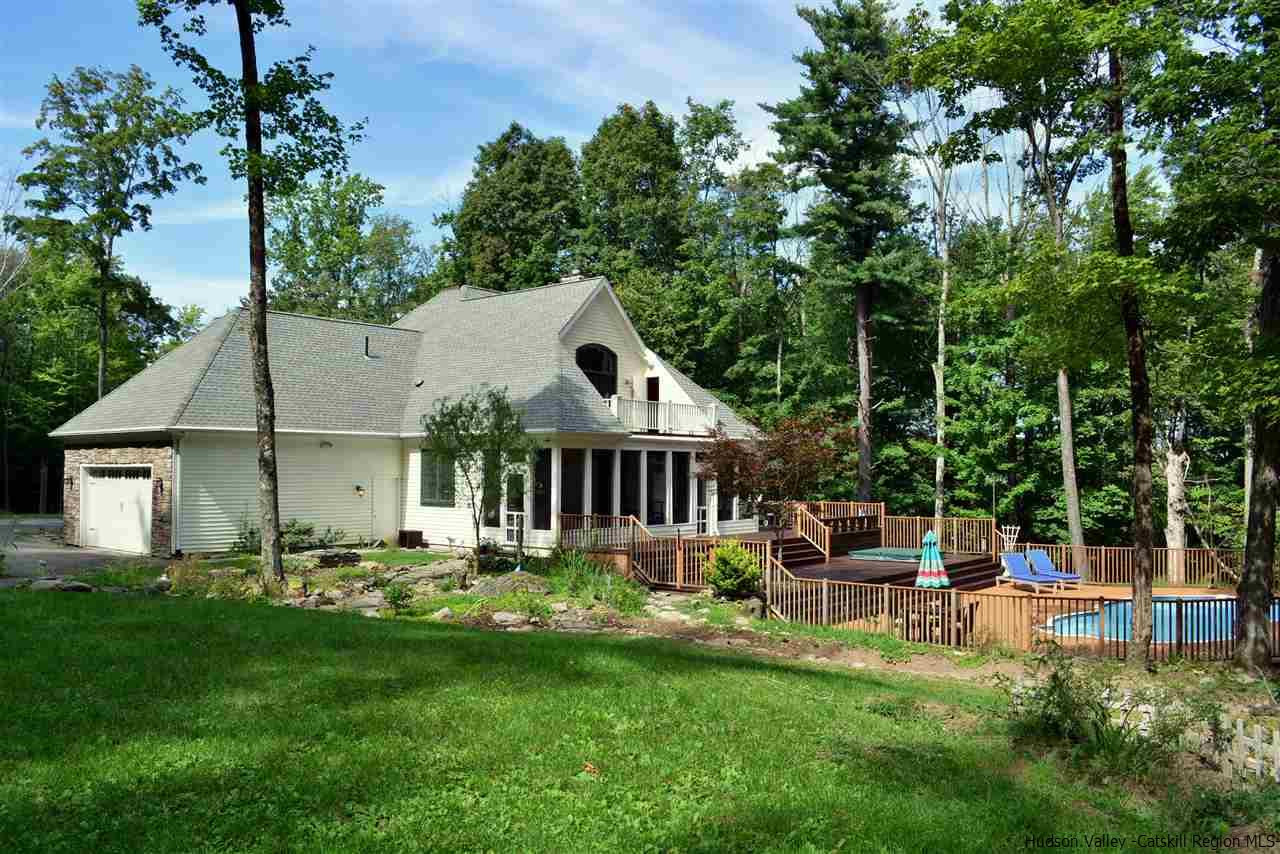4651 Atwood Road Stone Ridge, NY 12484 - Photo 4 of 31 a view of a house with backyard and sitting area