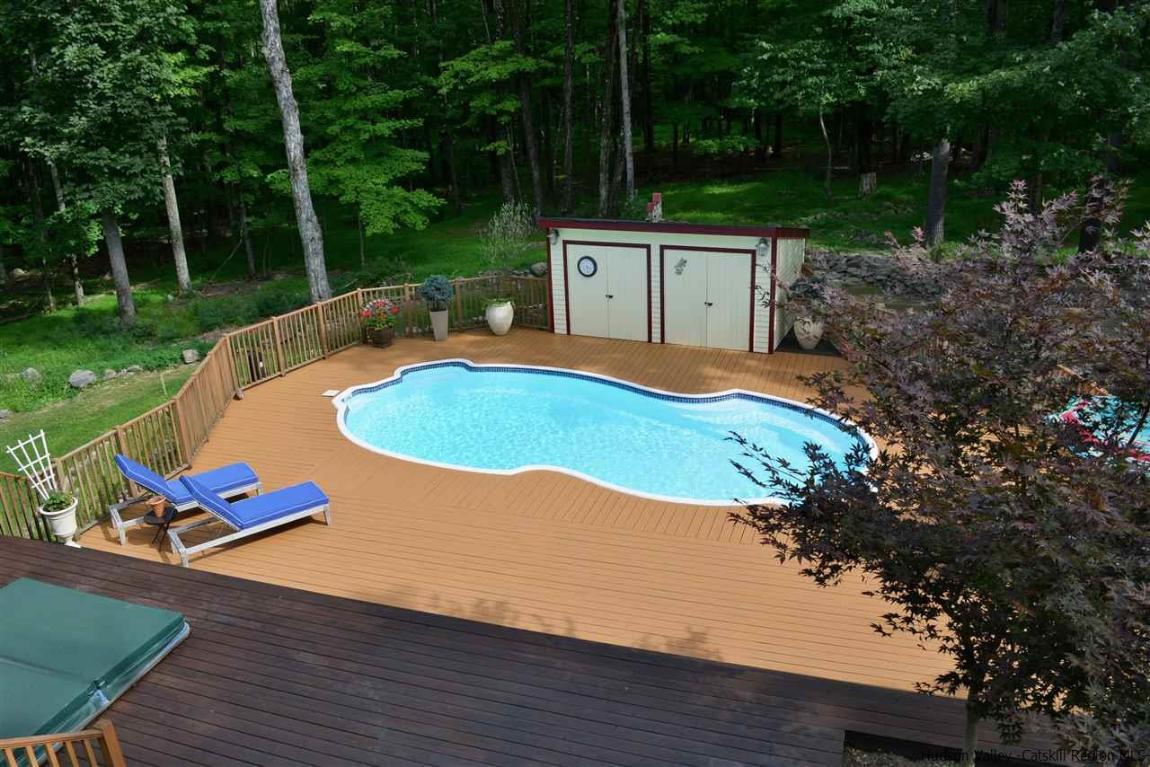 4651 Atwood Road Stone Ridge, NY 12484 - Photo 5 of 31 a view of a swimming pool with a yard